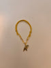 Yellow string with gold hearts and hawk charm